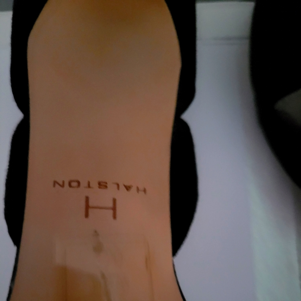 heels with rhinestones on heels size worn 1 time inside 1 stone missing on heel
